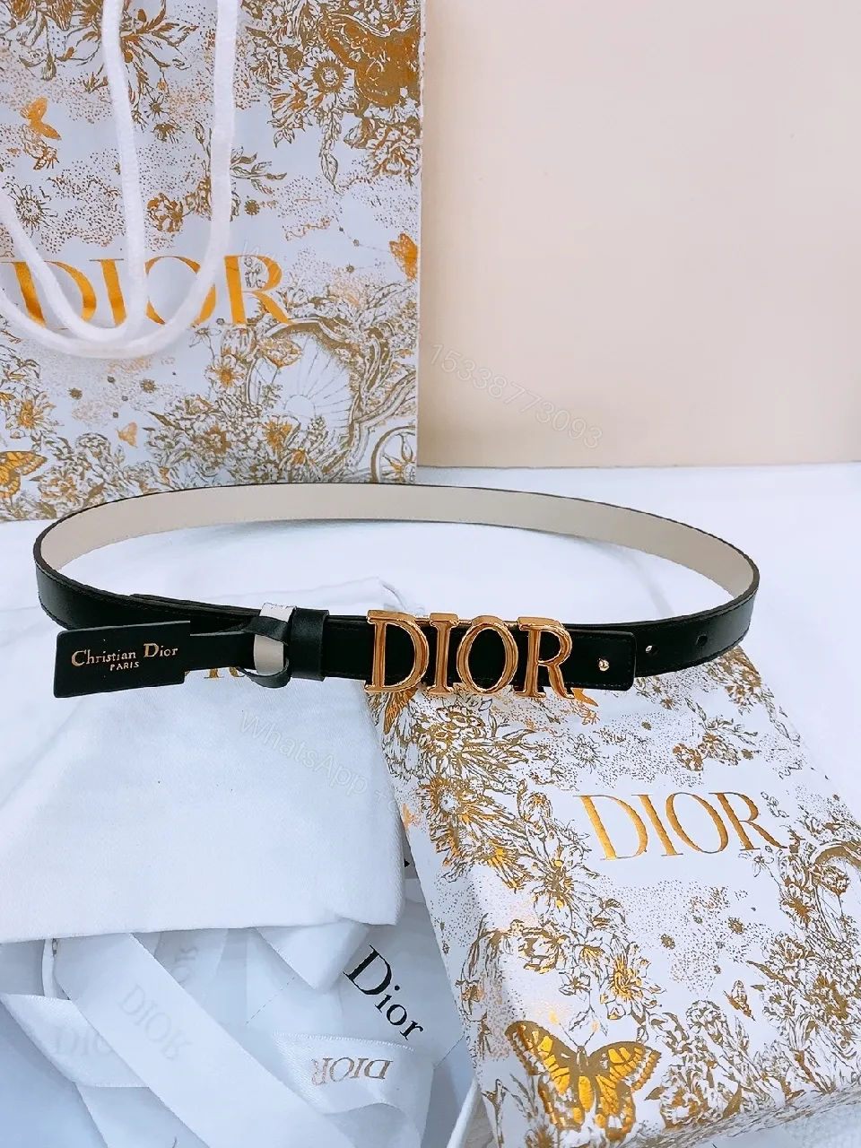 Minimalist Black Leather Belt with Gold Buckle Accent — view 1