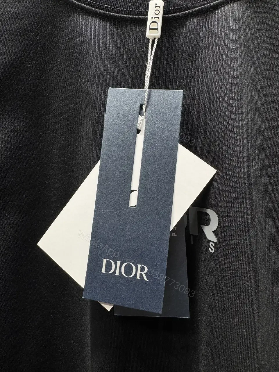 View 3 of Minimalist Black Tee with Subtle Logo – Everyday Luxe Tee