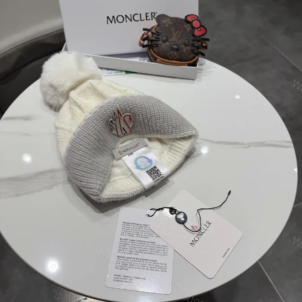 View 2 of Chic Winter Knit Beanie with Plush Pom and Moncler Accent