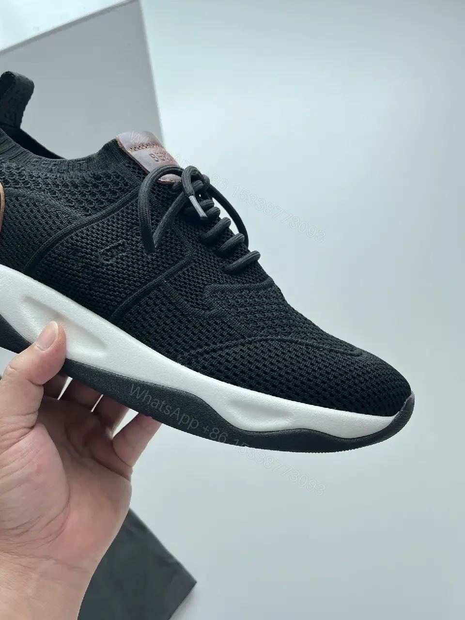 View 10 of Black knit sneakers with leather trim for everyday luxury and comfort