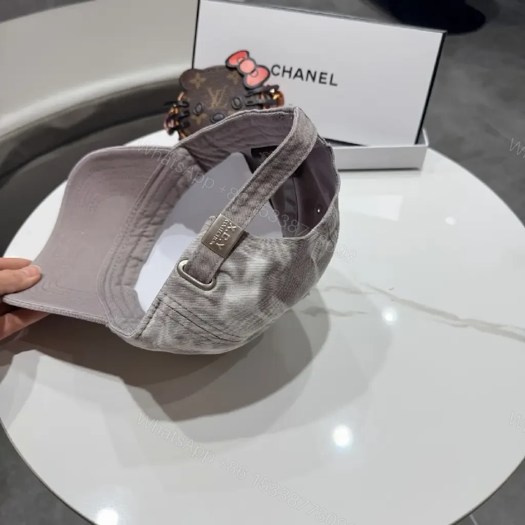 View 5 of Casual Luxe Cap: Subtle Denim, Interlock Emblem, Adjustable Strap