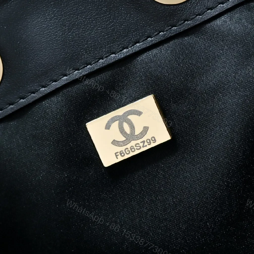 View 3 of Quilted Black Shoulder Bag: Gold Chain, Luxe Texture, Versatile Style