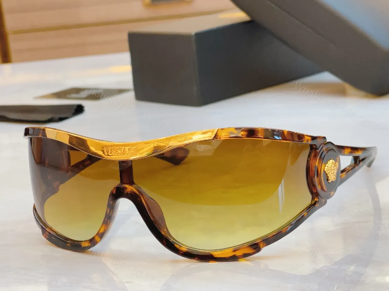 View 7 of Amber Frame Futuristic Sunglasses — Luxury UV Protection, Durable, Comfortable