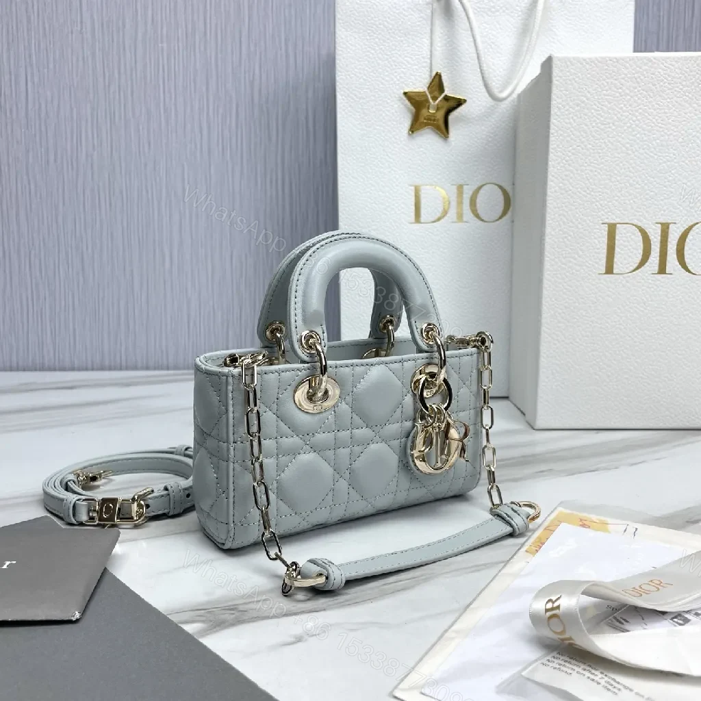 View 7 of Soft-Texture Quilted Mini Bag with Gold Charms, Calfskin, Elegant Chic, Luxury Carryall
