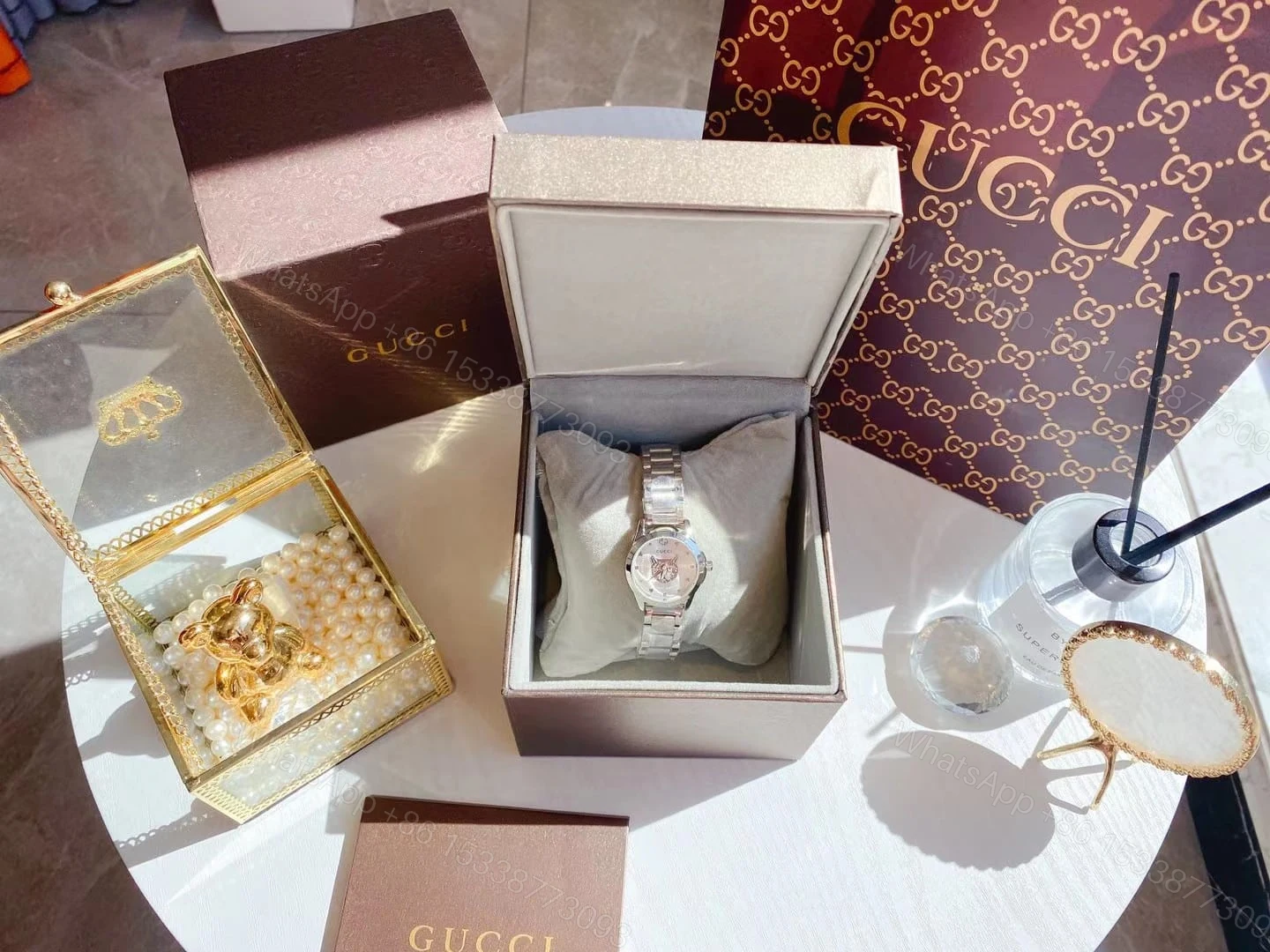 View 4 of Gucci G Timeless 27Mm