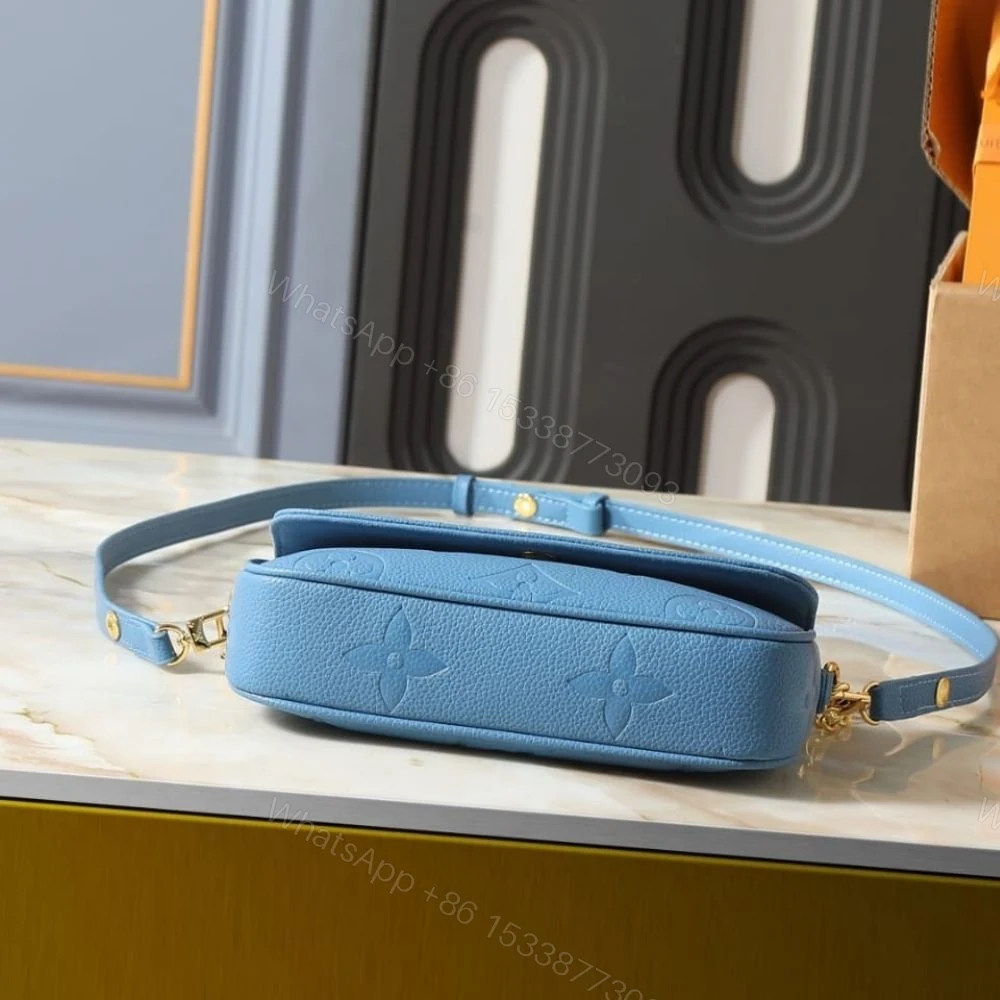 View 5 of Louis Vuitton Wallet On Chain Ivy Monogram Empreinte Blue Jean 23Cm M27755
