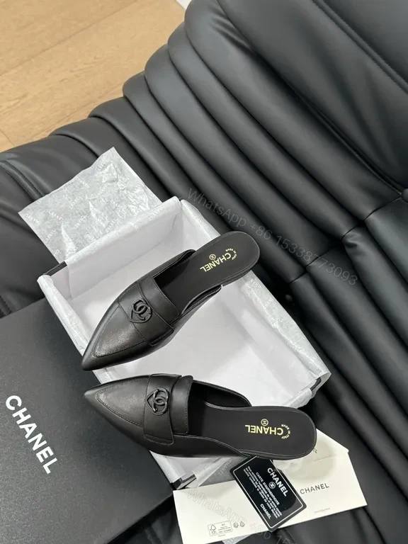View 2 of Chic Black Leather Mules with CC Detail - Luxury Comfort