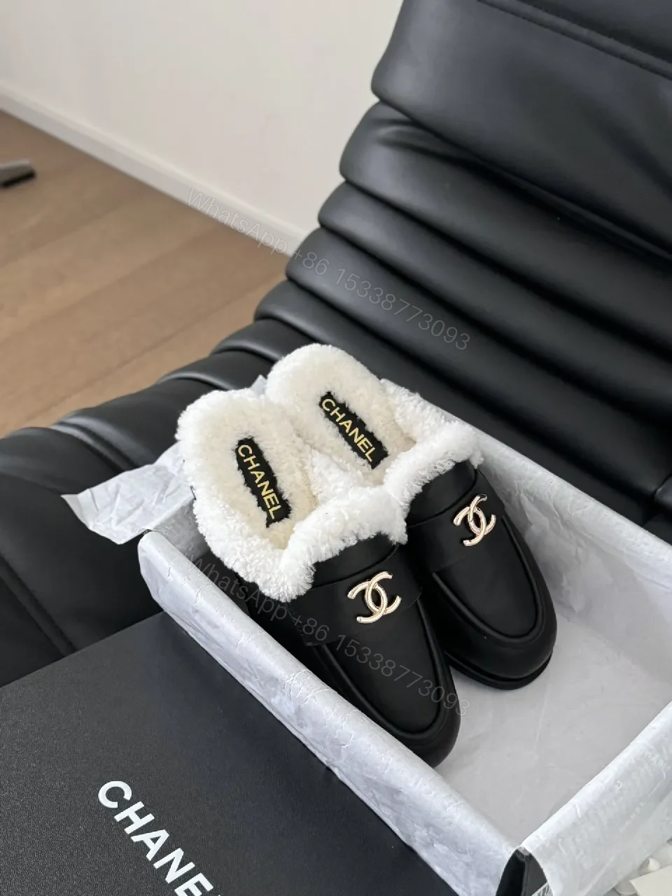 View 2 of Chic Black Leather Mules with Plush Shearling Lining