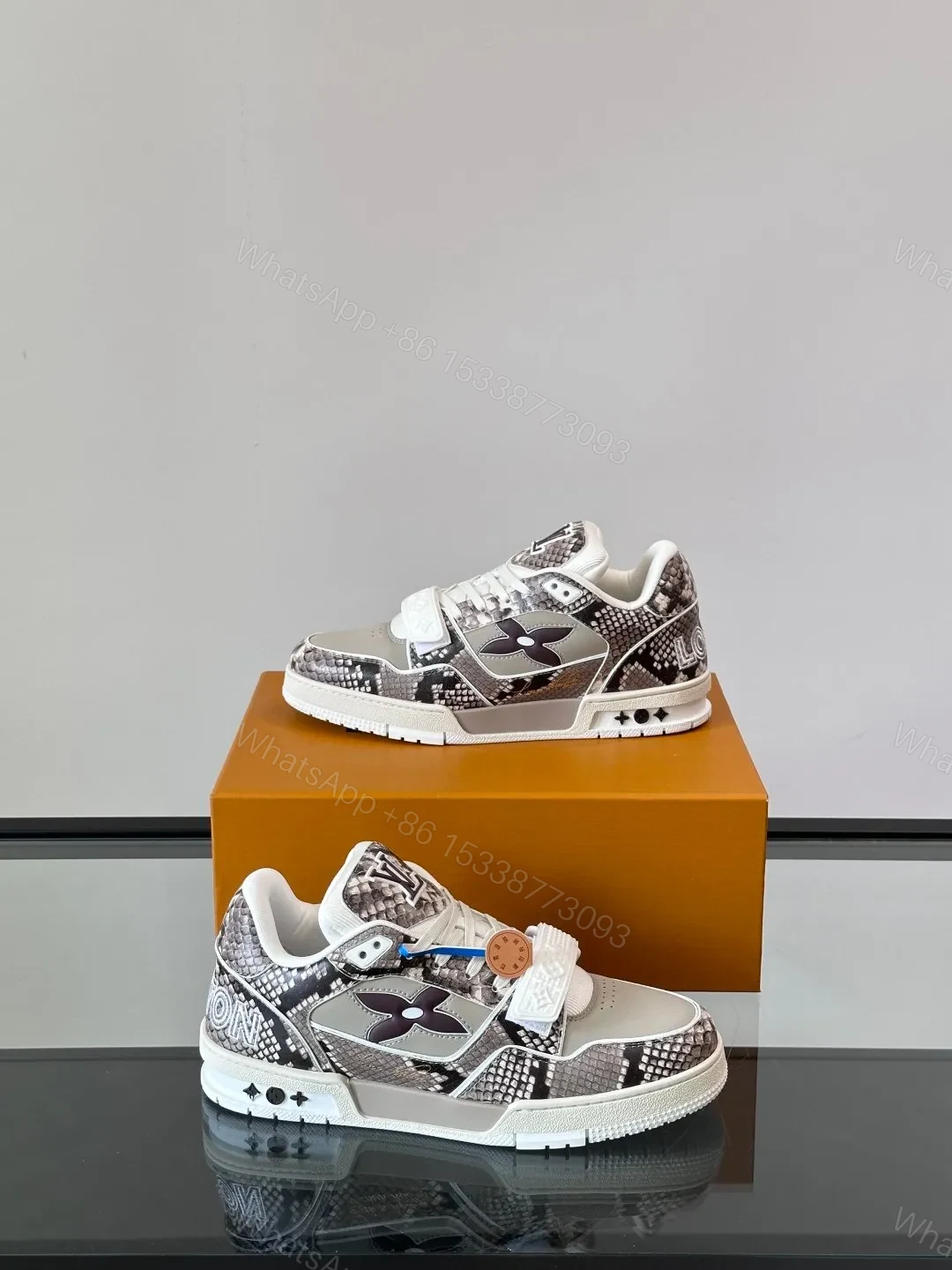 View 4 of LV Men Grey Snake Print Leather Sneakers