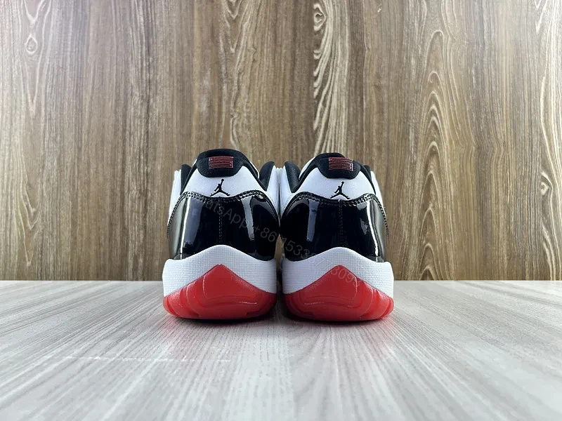 View 3 of Black & White Contrast Runner with Bold Red Sole Sneakers
