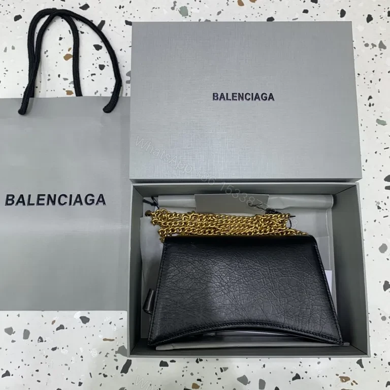 View 8 of Chic Black Leather Mini Bag with Gold B Clasp â€“ Compact Luxury