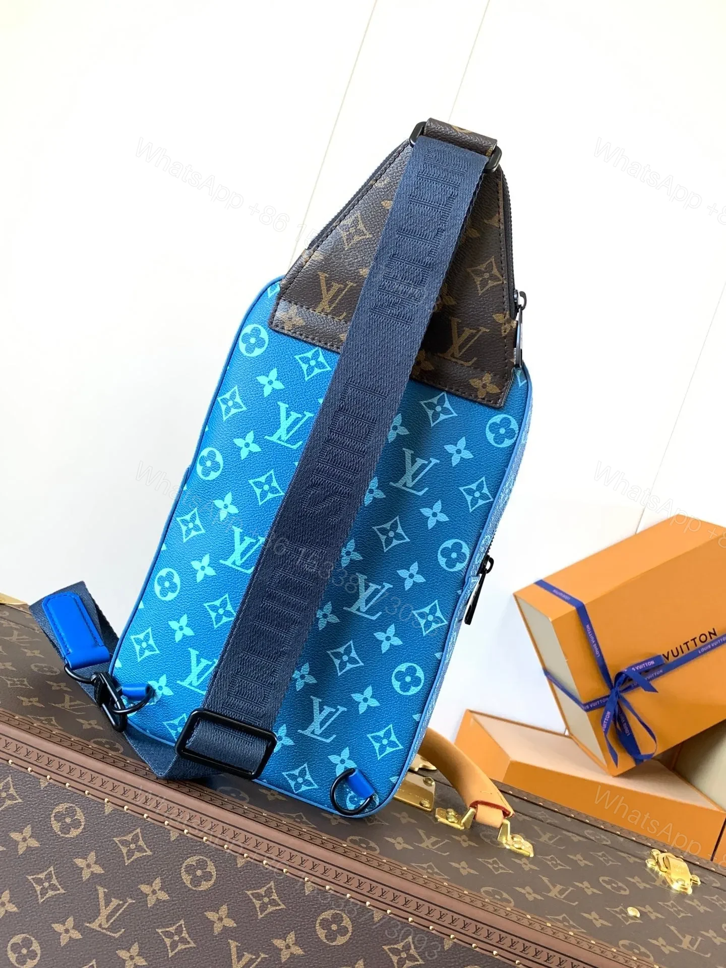 View 2 of LV AVENUE SLINGBAG 31 IN BLUE AND BROWN TAIGA LEATHER