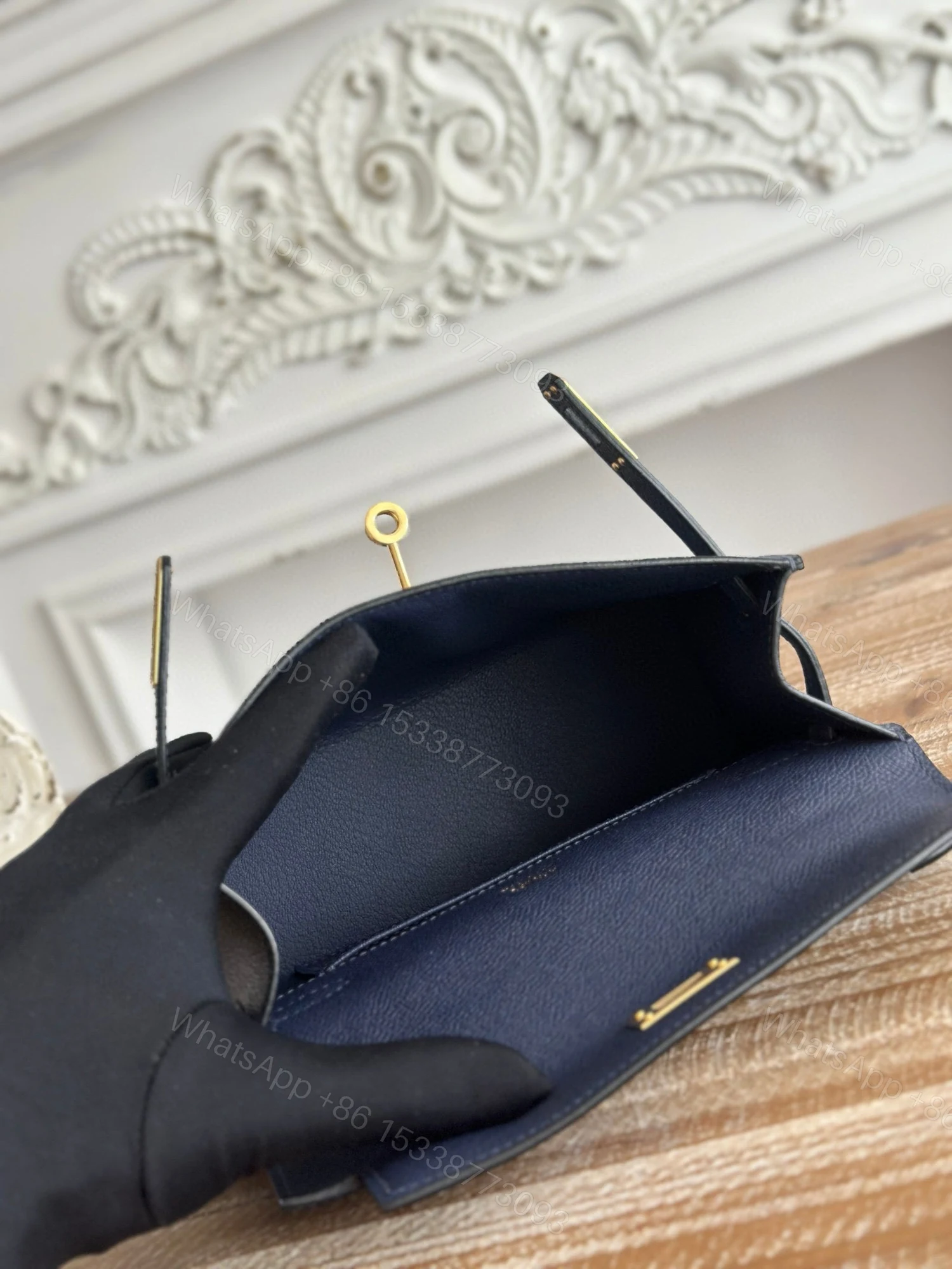 View 2 of HERMES KELLY MINI POCHETTE 22 IN NAVY BLUE