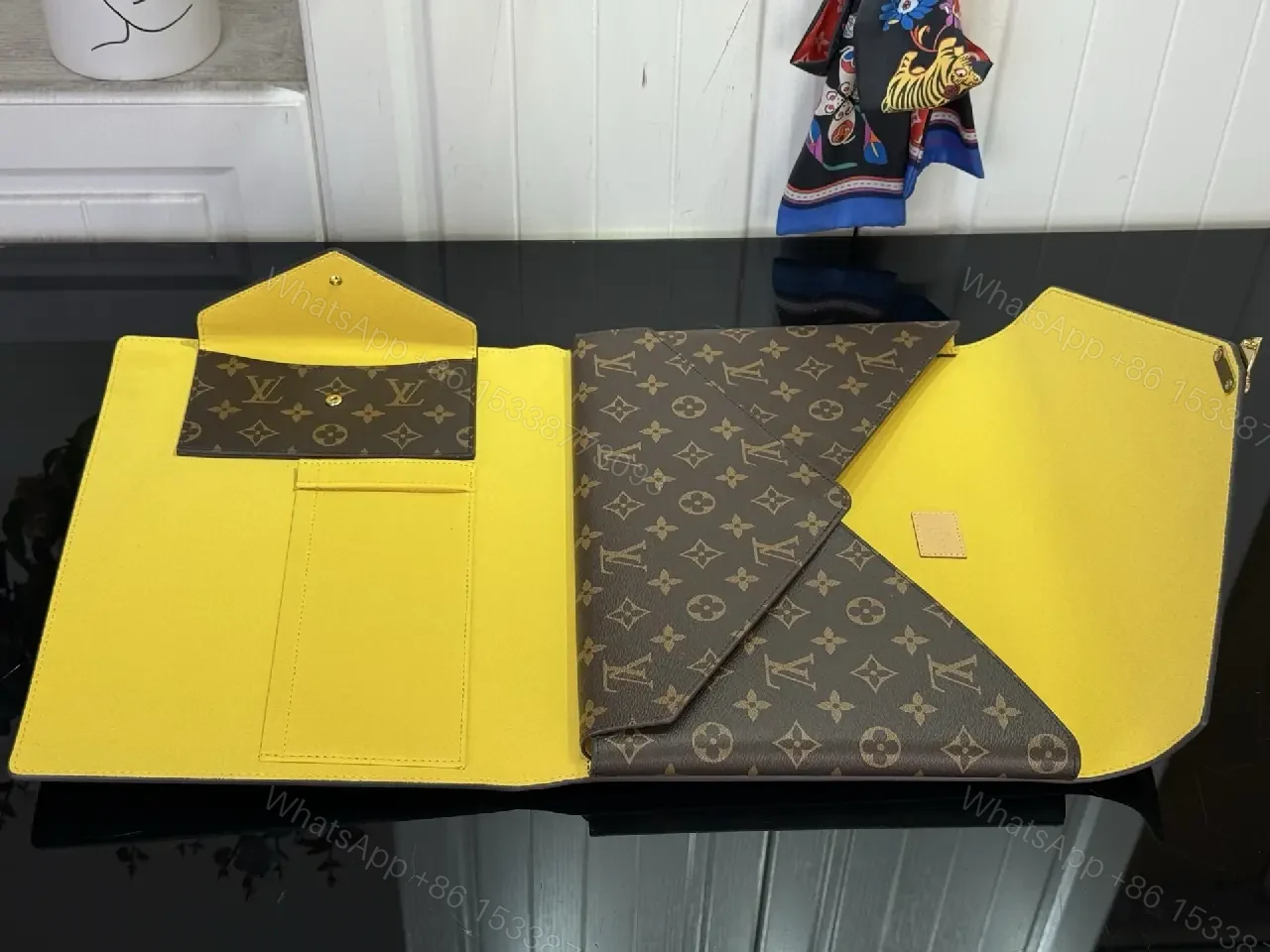 View 9 of Brown Coated-Canvas Clutch: Monogram, Structured, Gold Hardware