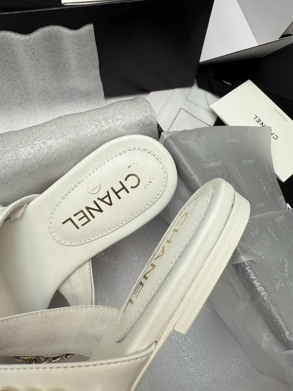 View 4 of Elegant White Leather Sandals with Gold Chain Accent