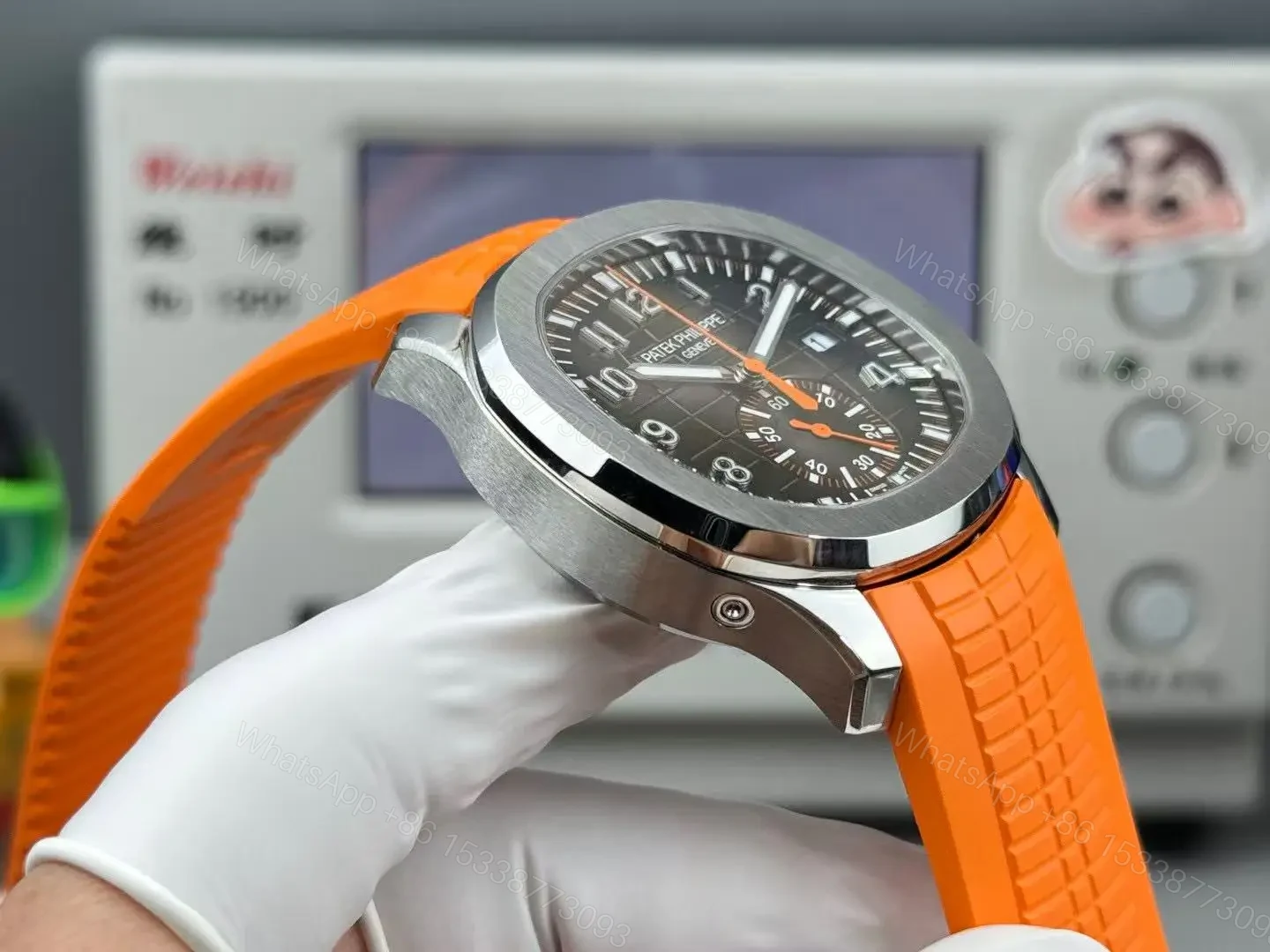 View 5 of Patek Philippe super clone Aquanaut Black Dial Orange Rubber Strap Premium 42MM PATEK-AQUA42-BLK-ORG