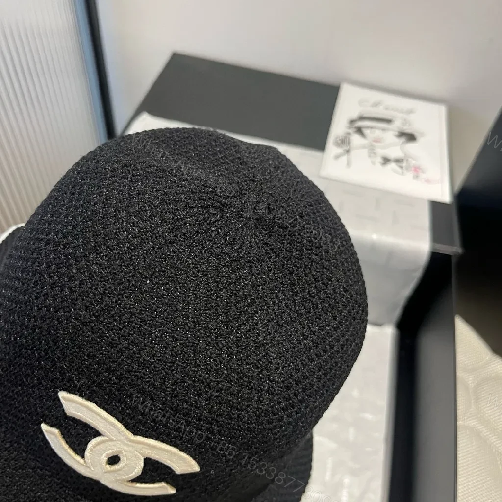 View 4 of Navy Knit Bucket Hat: Luxe Logo, Embossed Detailing