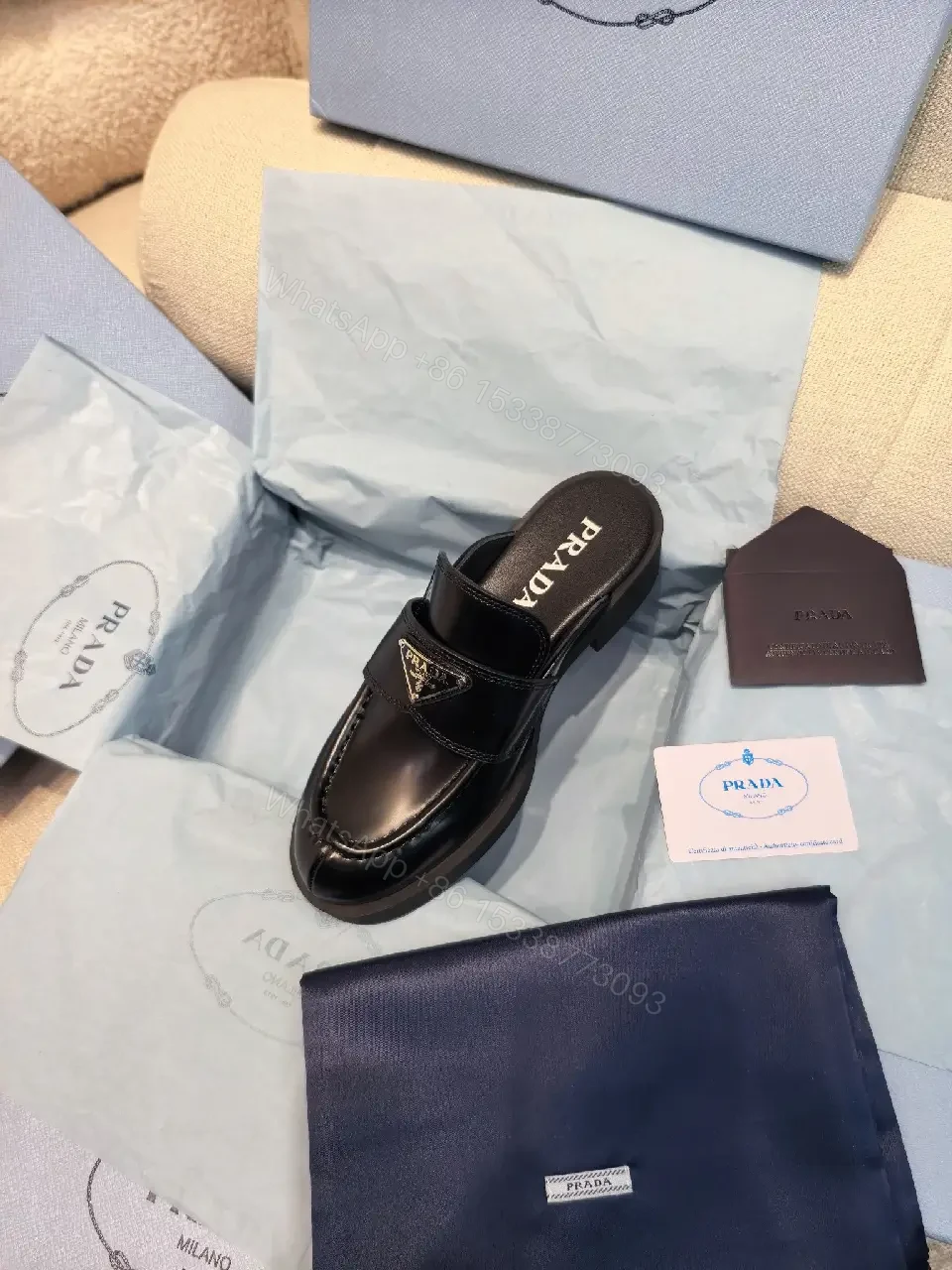 View 2 of Black Leather Prada Mules with Logo Detail Sliders, Women’s Fashion