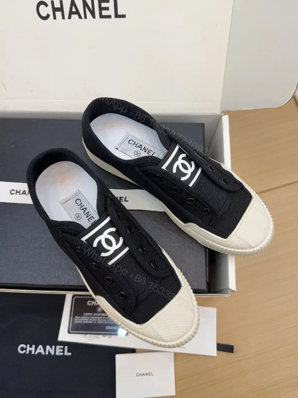 View 6 of Minimalist Black Canvas Sneakers with Logo Strap