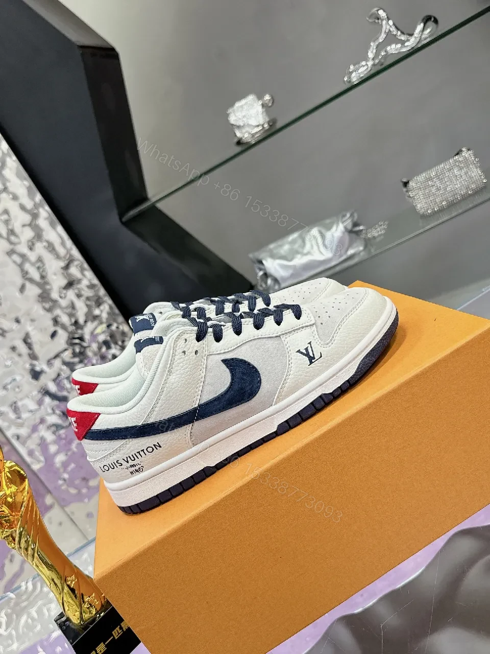 View 9 of White Leather Navy Accented Low-Top Sneakers: Premium Comfort, Subtle LV-Inspired Detailing