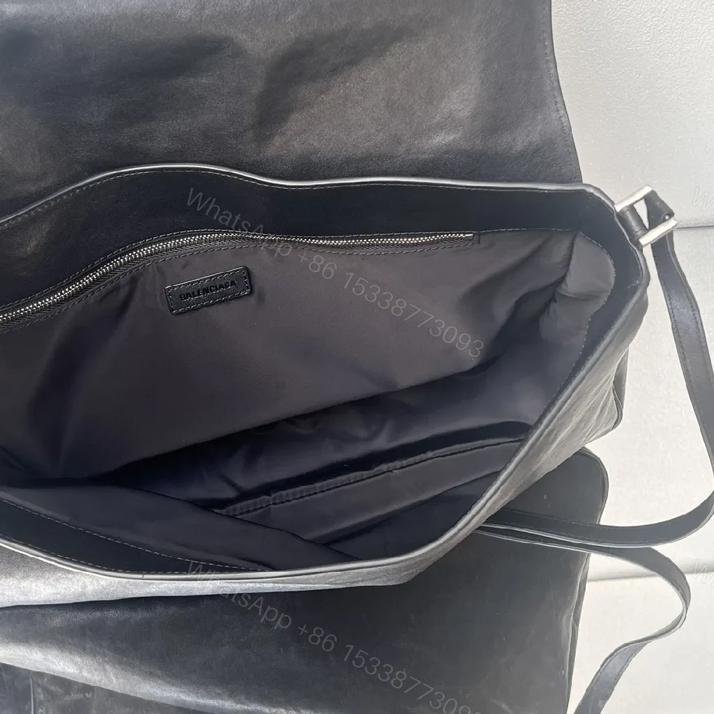 View 8 of Minimalist Black Leather Crossbody: Compact Luxury Bag