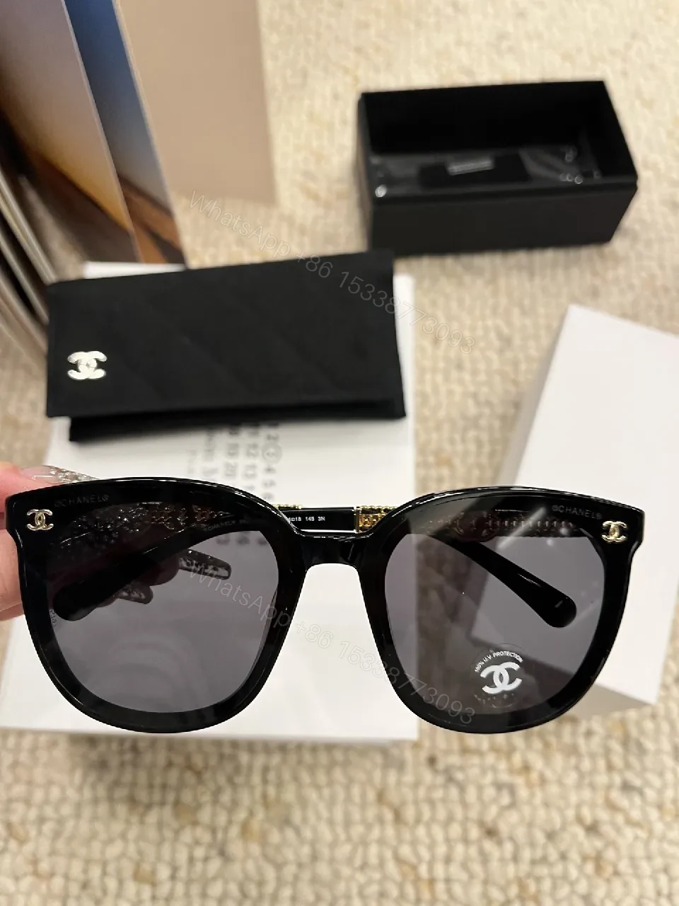 Bold Cat-Eye Sunglasses with Signature Detailing — view 1