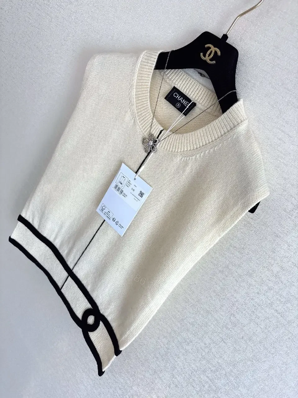View 2 of Cream Knit Vest with Signature Trim - All-Season Comfort