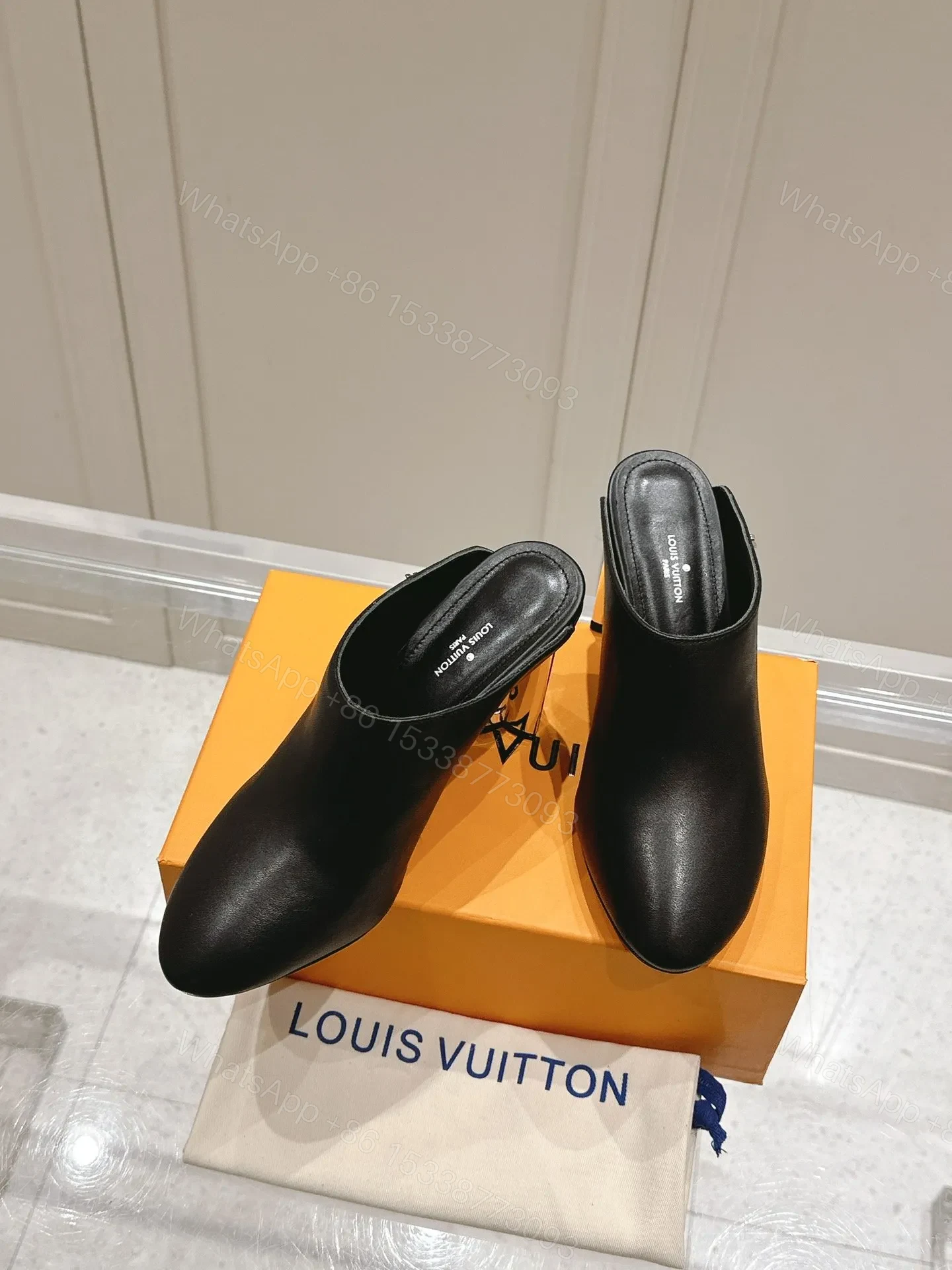 View 4 of LV Women Black Leather Mules Heels