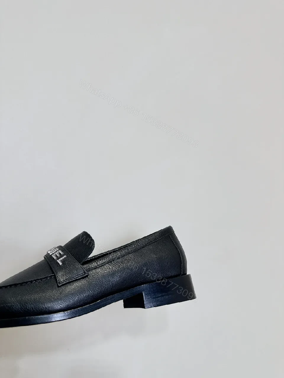 View 5 of Black Leather Slip-On with Logo Strap – Modern Luxe Comfort