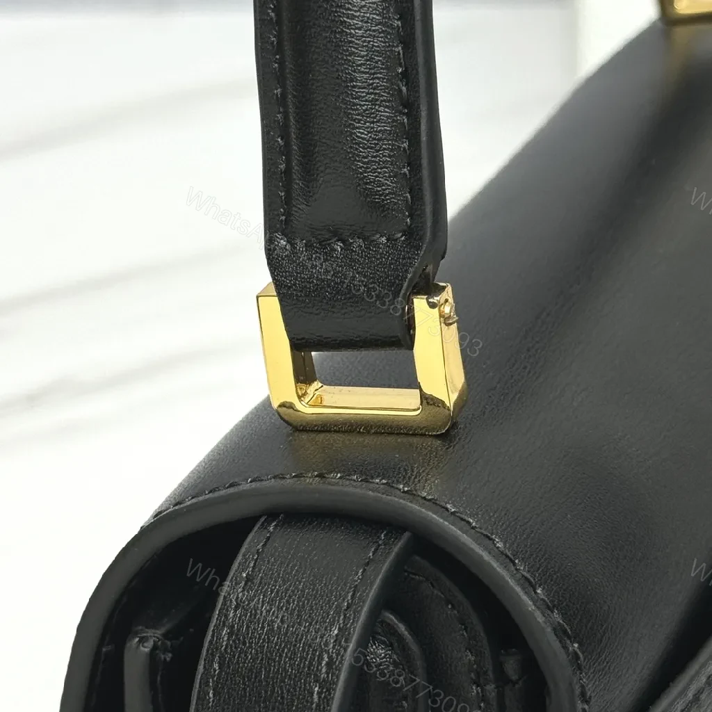 View 2 of Chic Black Leather Saddle Bag with Gold Hardware
