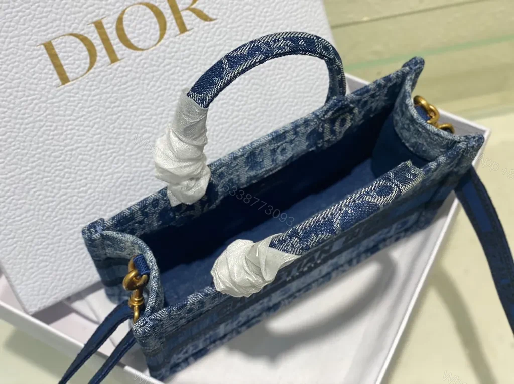 View 3 of Compact Denim-Inspired Crossbody with Dior Pattern and Straps