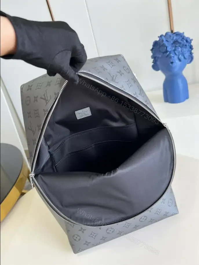 View 9 of LOUIS VUITTON DISCOVERY BACKPACK PM TAIGARAMA – LBV387