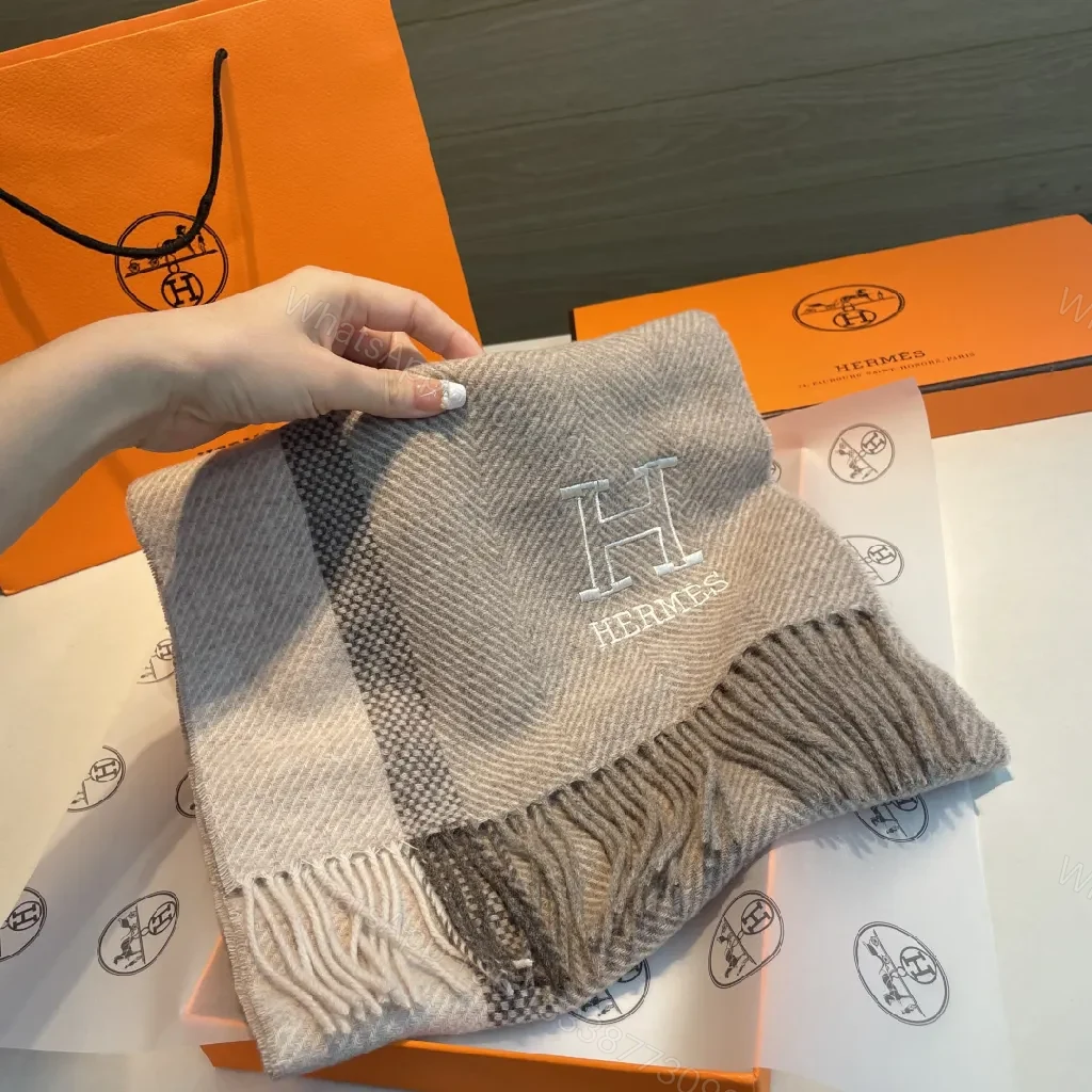View 4 of Neutral Herringbone Knit Scarf with Subtle Emblem Detail