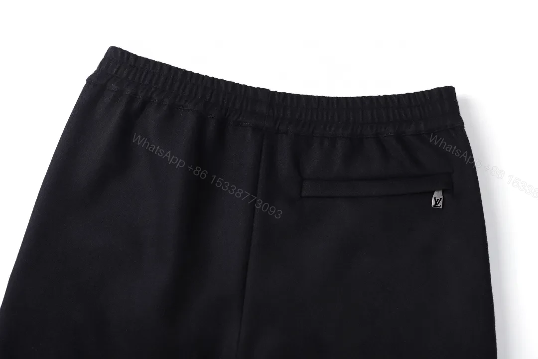 View 5 of Chic Black Wide-Leg Track Pants with Subtle Monogram Monstère