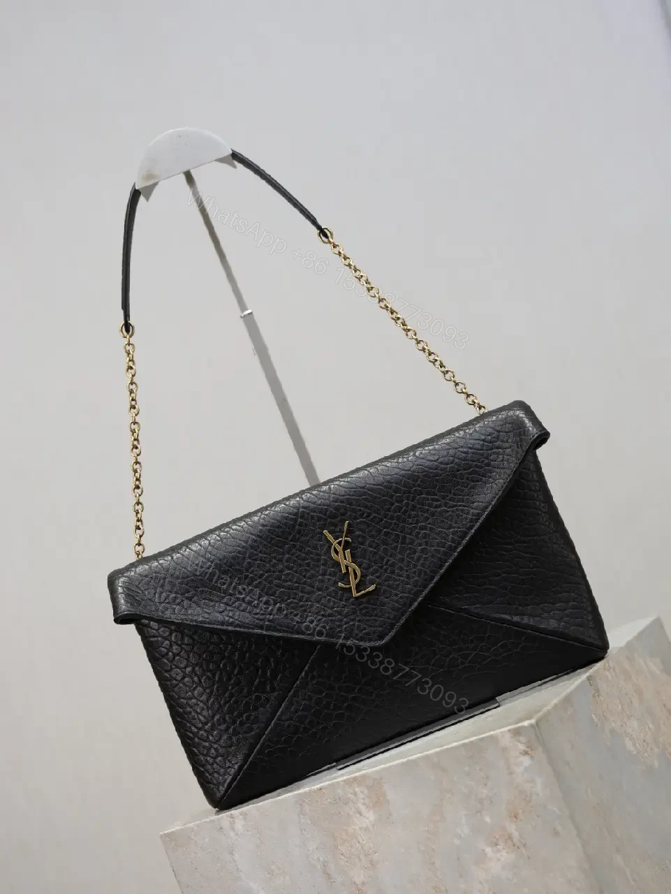 View 6 of Pebbled Leather Envelope Flap Bag, Gold Logo, Day-to-Night Versatility