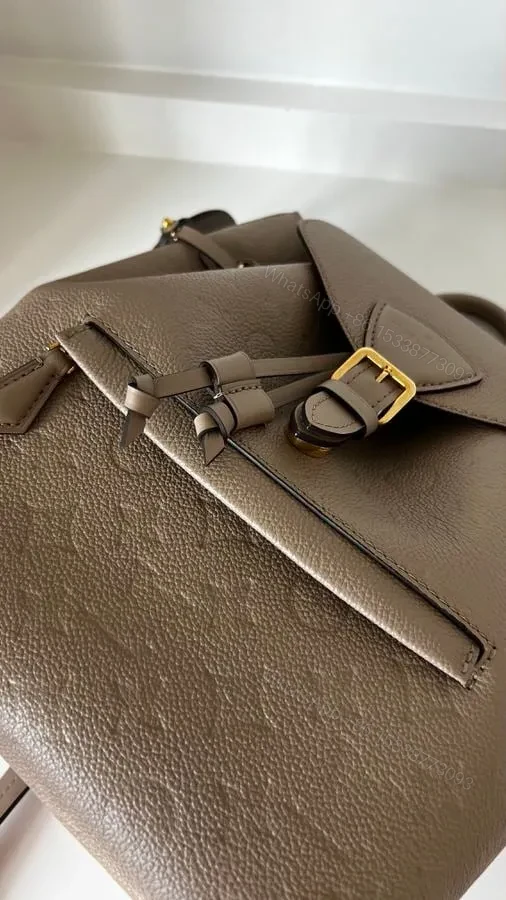 View 9 of LOUIS VUITTON Monogram Empreinte Montsouris PM Backpack Replica