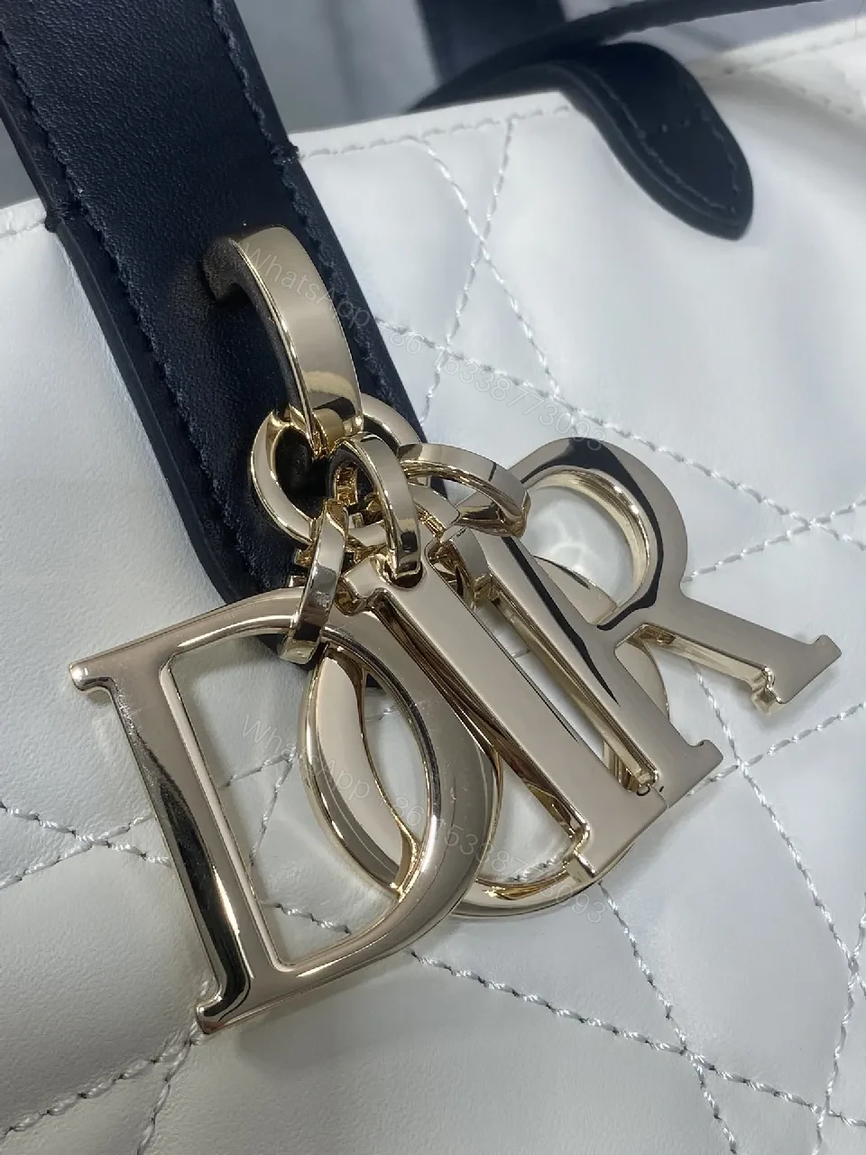 View 6 of Quilted Mini Handbag with Gold Charm - Compact Luxury Bag