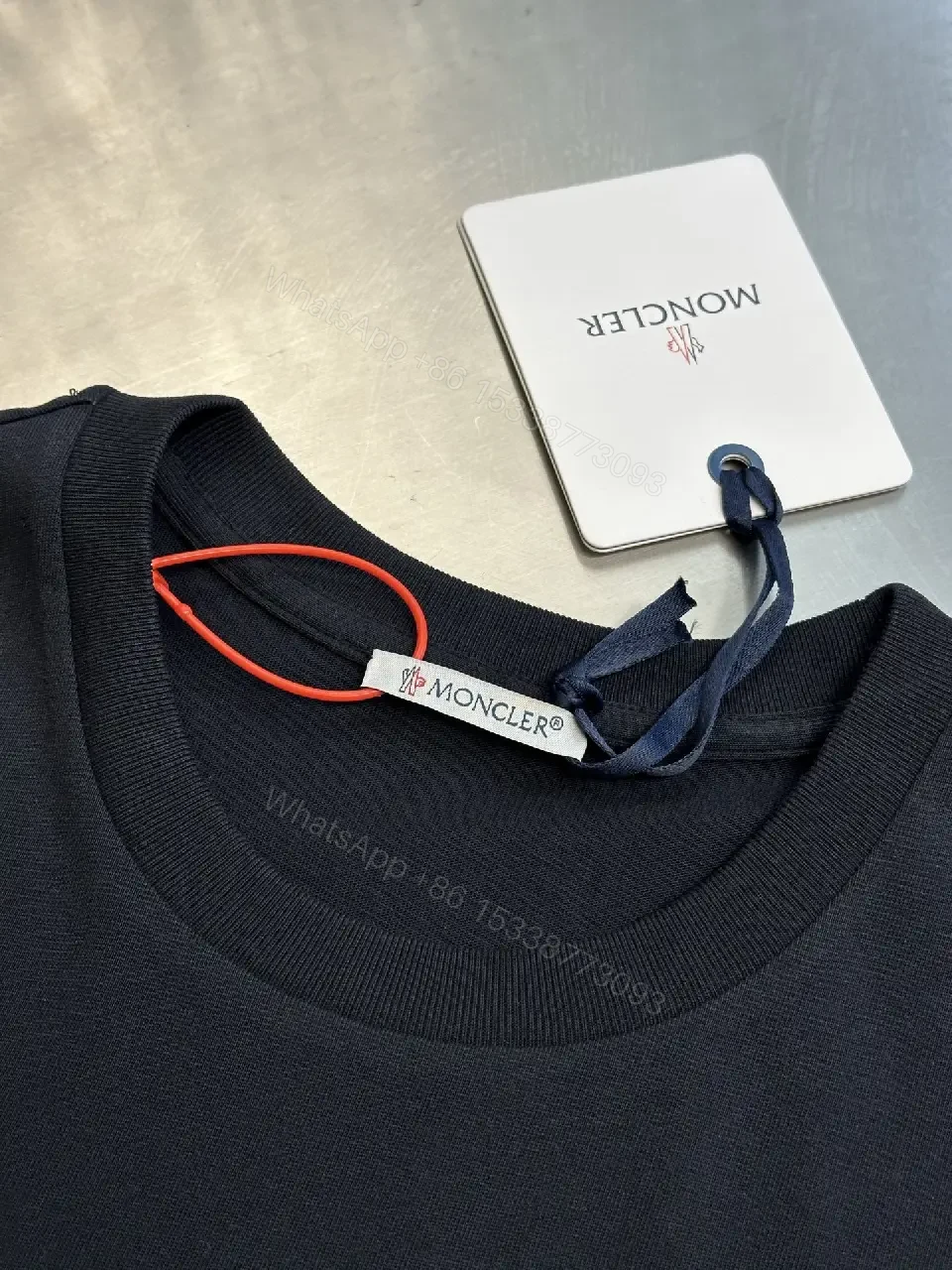 View 3 of Relaxed Luxury Patch Tee - Cotton Blend, Subtle Branding, Casual/Smart-casual