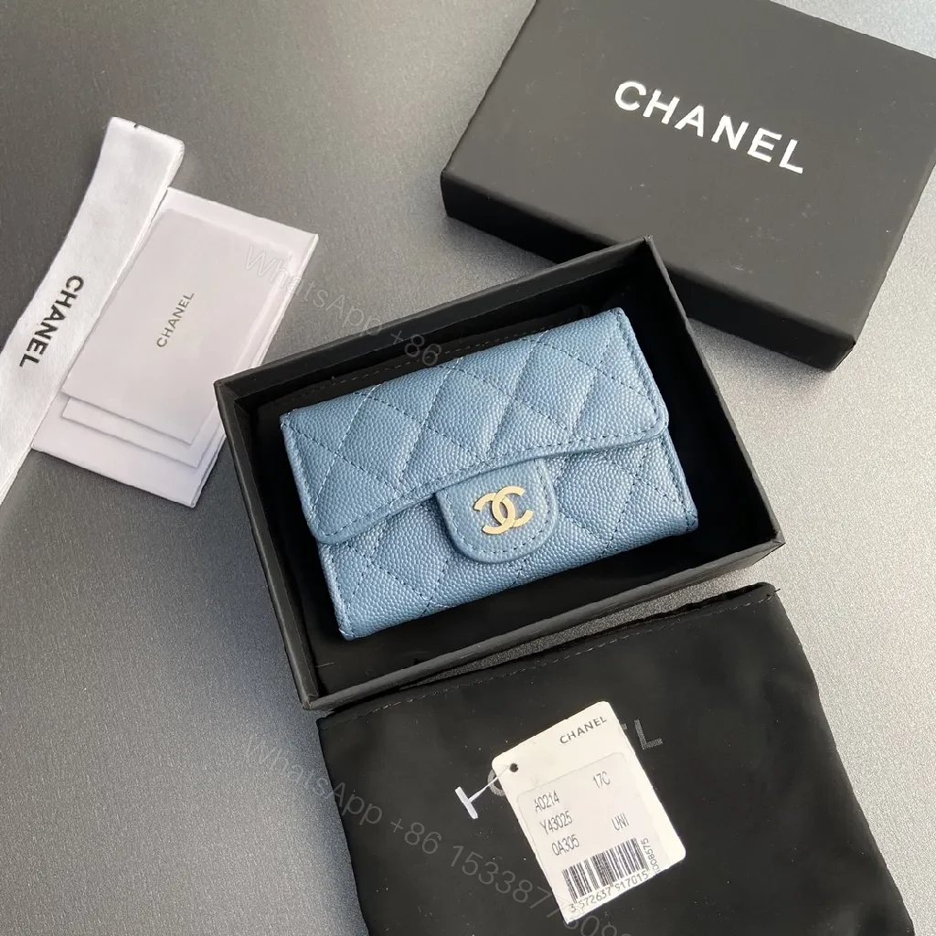 View 5 of Powder Blue Quilted Lambskin Wallet: Compact, Day-to-Night Chic