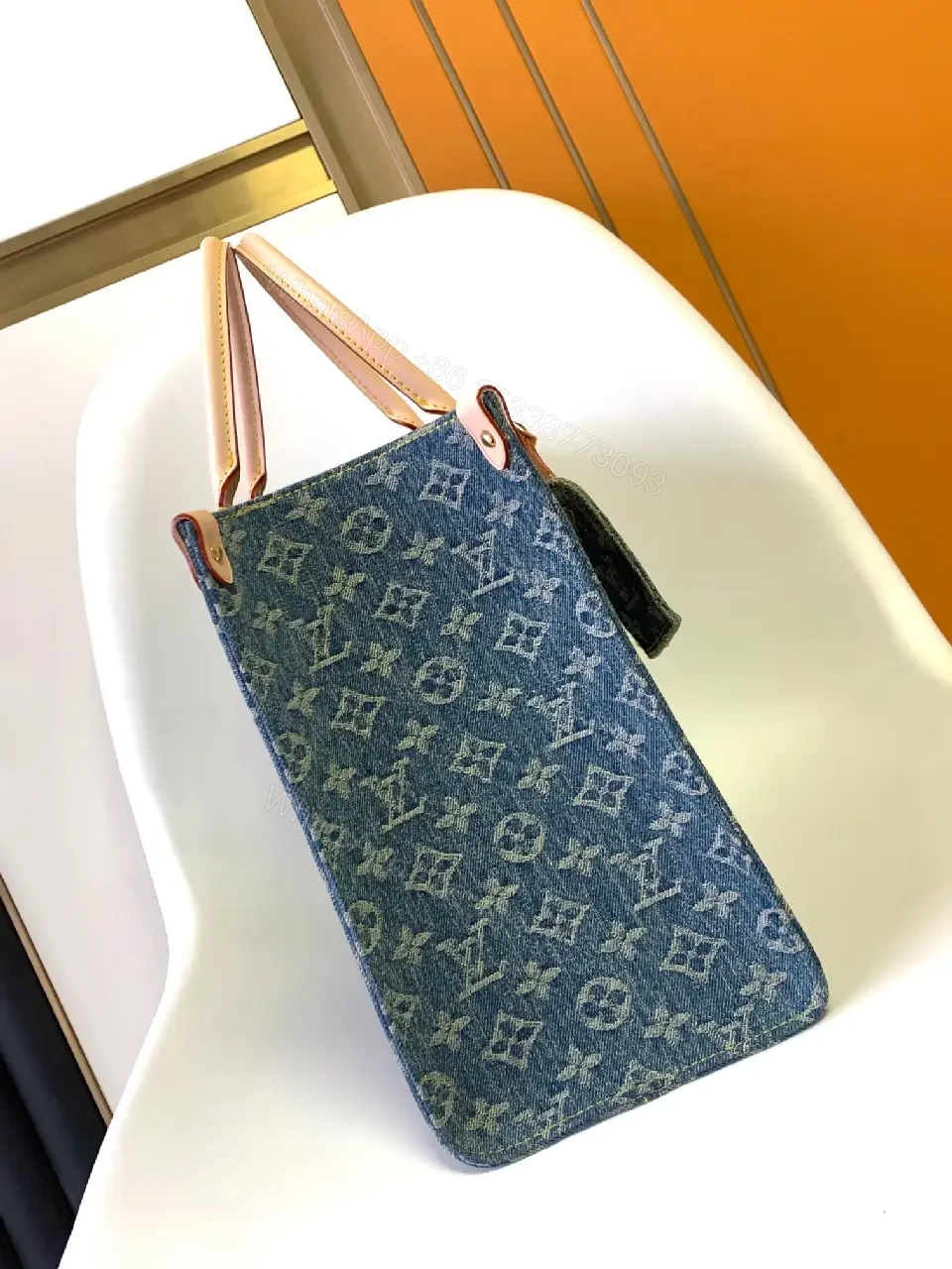 View 9 of Denim Monogram Tote: Premium Denim Leather-Trim Tote with Signature Details