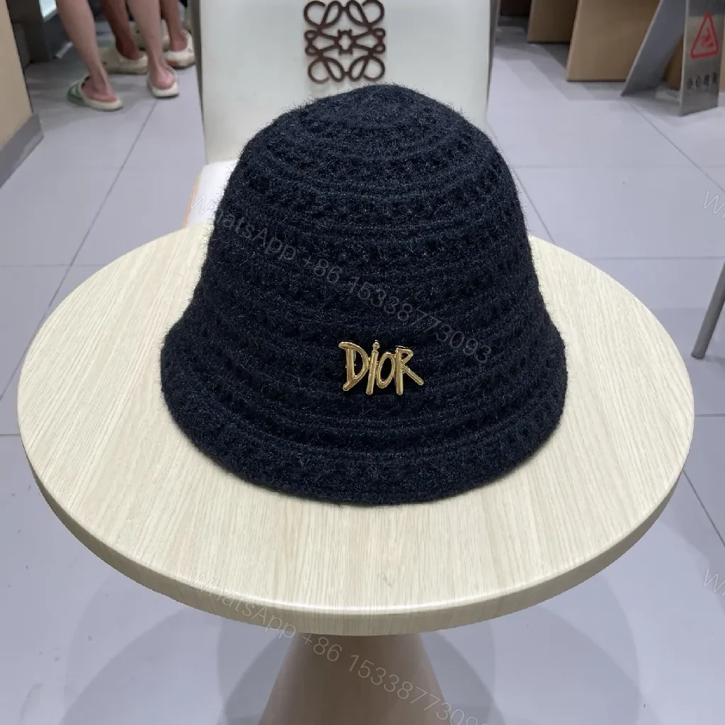Black Knit Bucket Hat with Gold Emblem, Premium Texture, Everyday Luxury — view 1