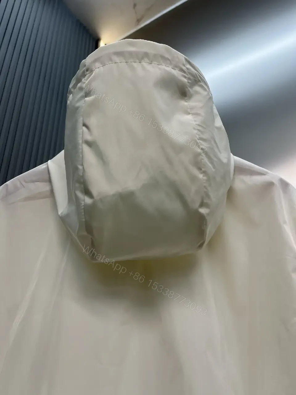 View 9 of Off-White Cream Lightweight Hooded Windbreaker with Zipper Front