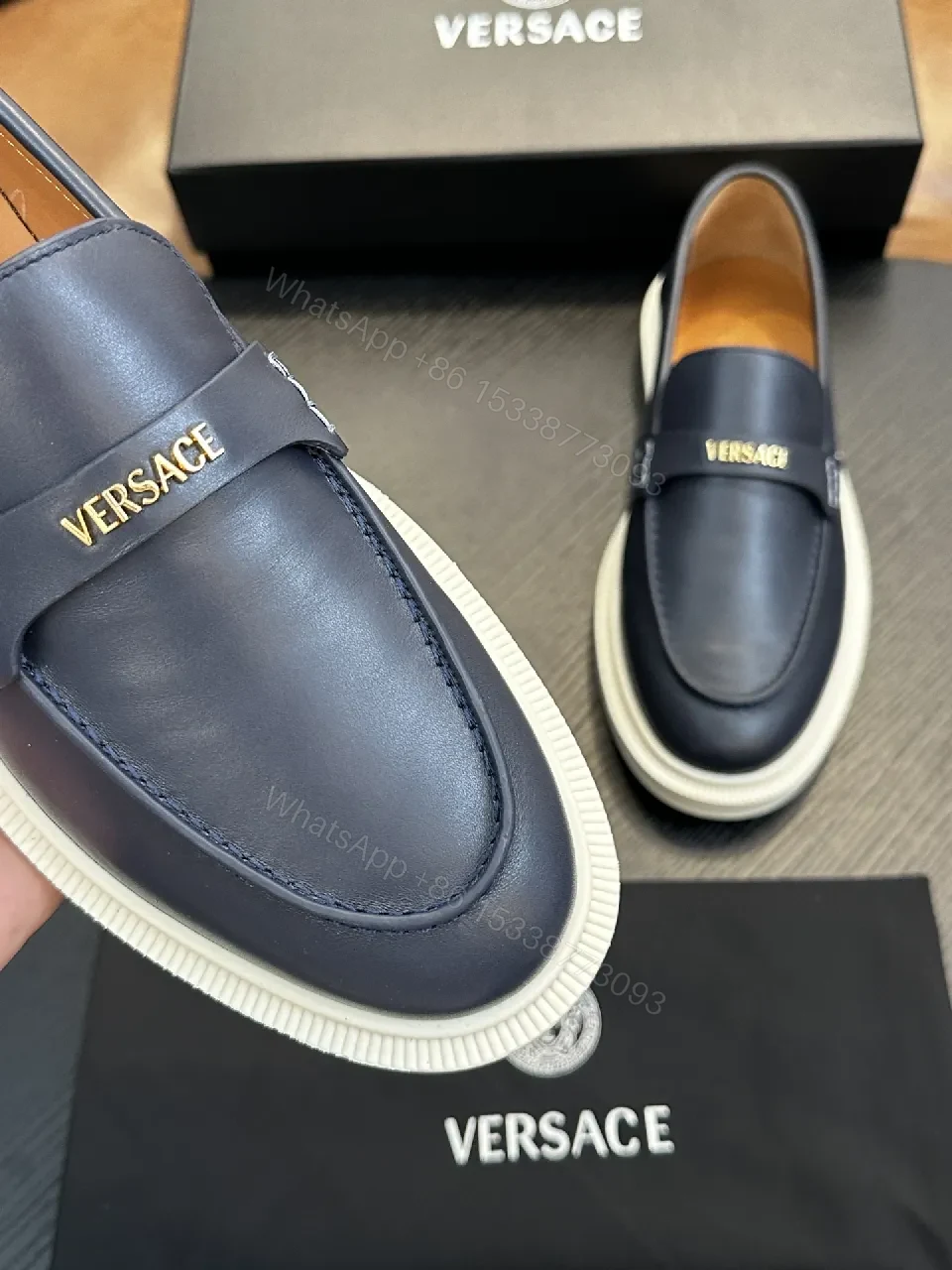 View 2 of Navy Leather Driver Loafers with Gold Hardware Details