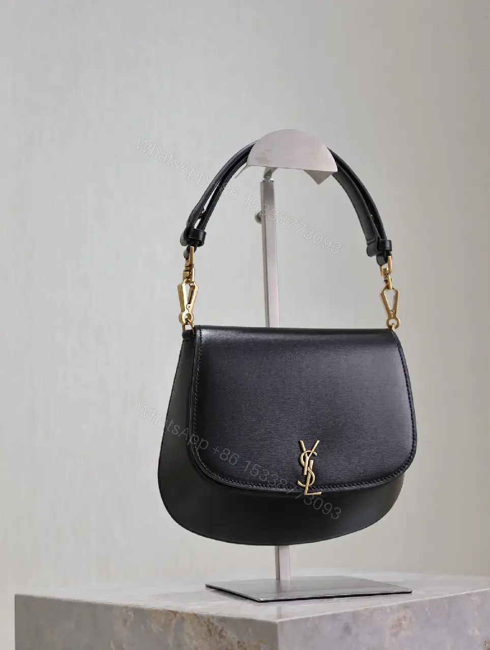 View 8 of Structured Leather Crossbody with Gold Emblem, Compact & Versatile Bag