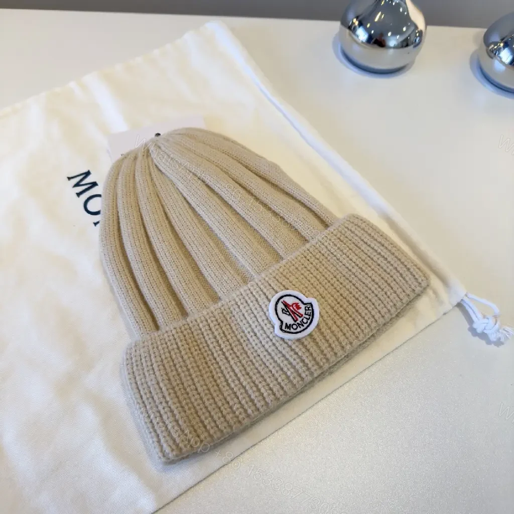 View 7 of Beige Ribbed Knit Beanie – Luxury, Signature Patch, Everyday Style