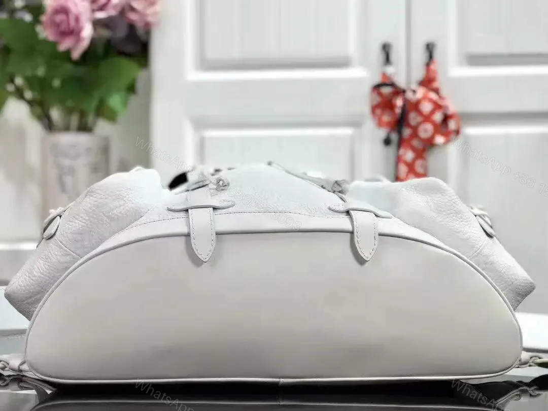 View 5 of Louis Vuitton Christopher Monogram Empreinte White
