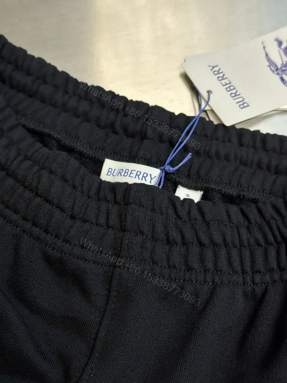View 3 of Black Cotton Shorts Burberry London Logo Key Feature Elastic Waistband Shorts