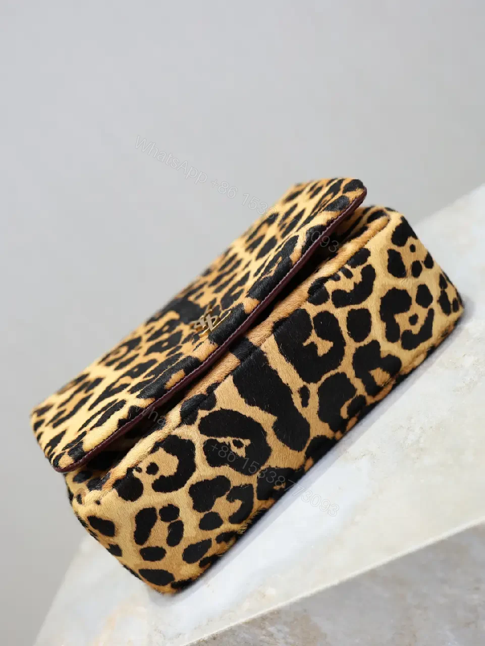 View 3 of Leopard Print Mini Bag with Gold Accent: Compact Luxury Bag
