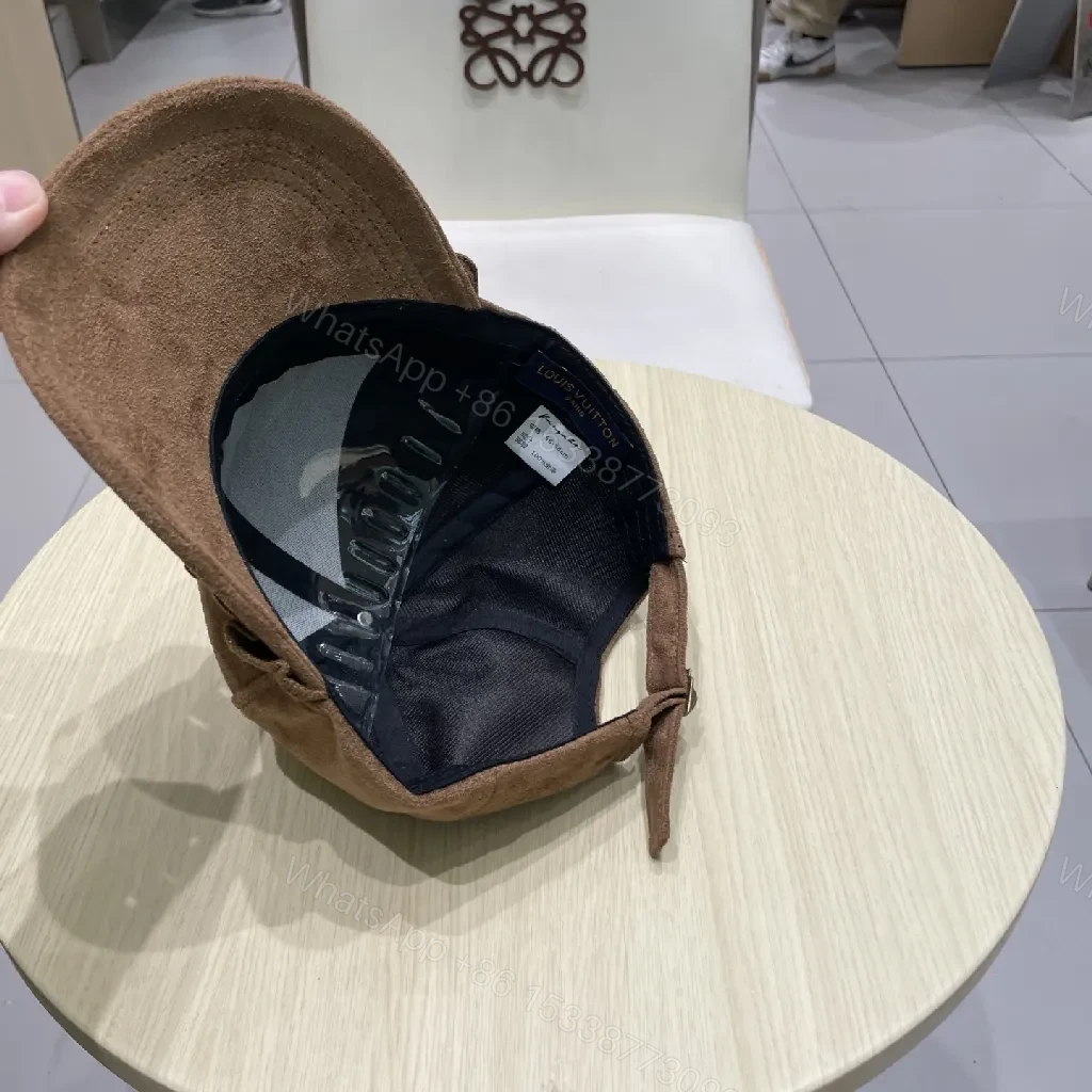 View 2 of Brown Suede Cap with Gold Emblem - Textured Luxury Cap