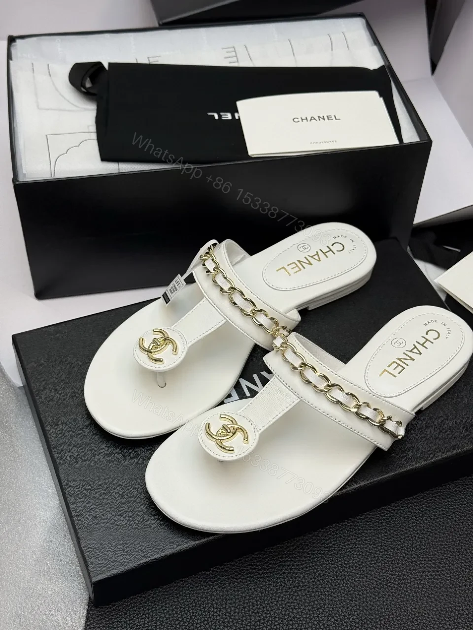 View 7 of Elegant White Leather Sandals with Gold Chain Accent